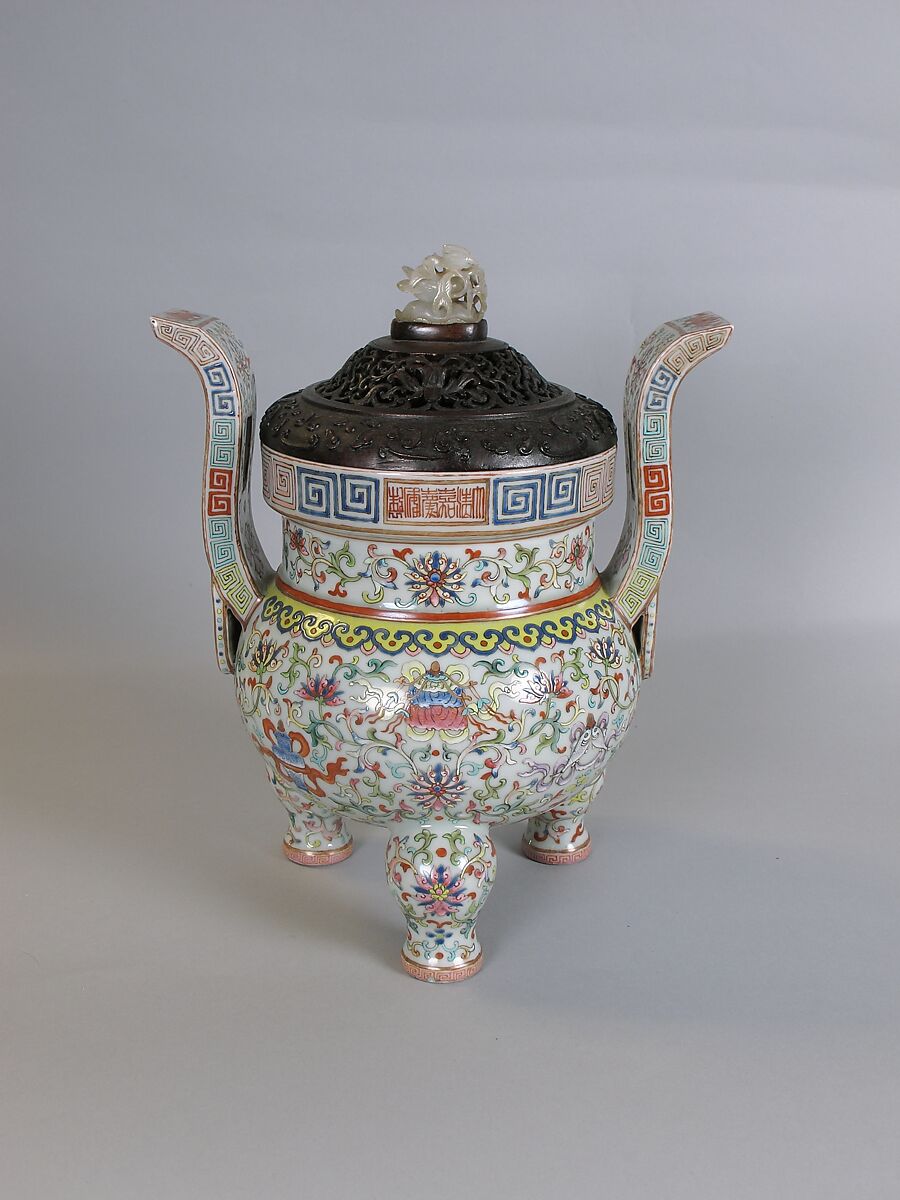 Tripod incense burner with Buddhist auspicious symbols, Porcelain painted in overglaze polychrome enamels (Jingdezhen ware), wooden cover with jade knob, China 