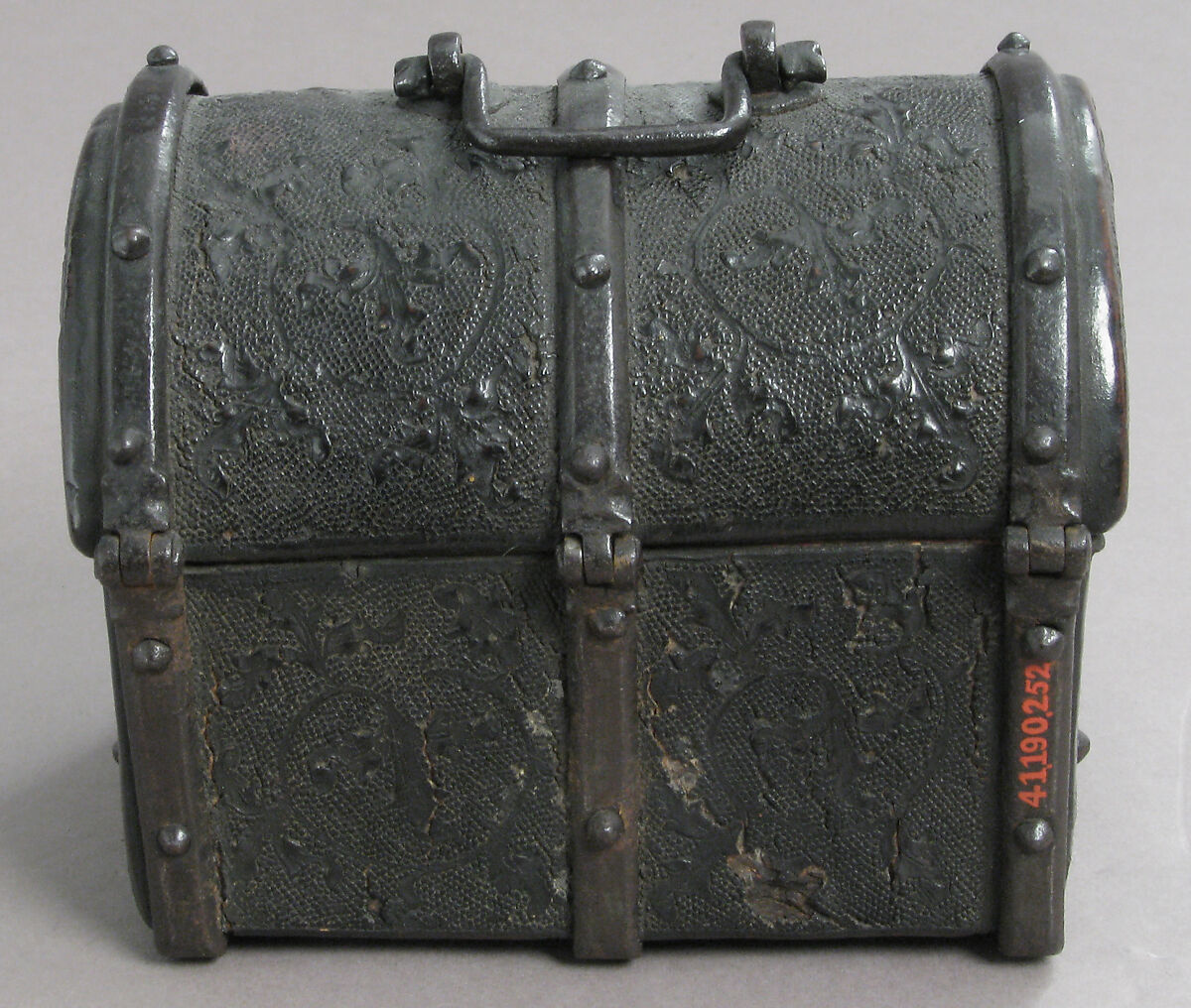 Coffret, Cuir bouilli (tooled leather), iron fittings, wood core, parchment lining, European