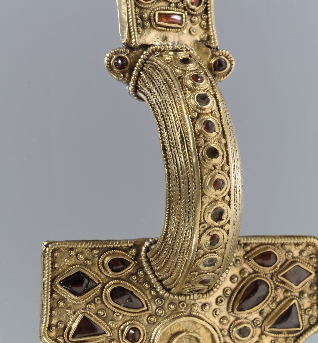 Bow Brooch, Silver with gold-sheet overlay and garnets, East Germanic