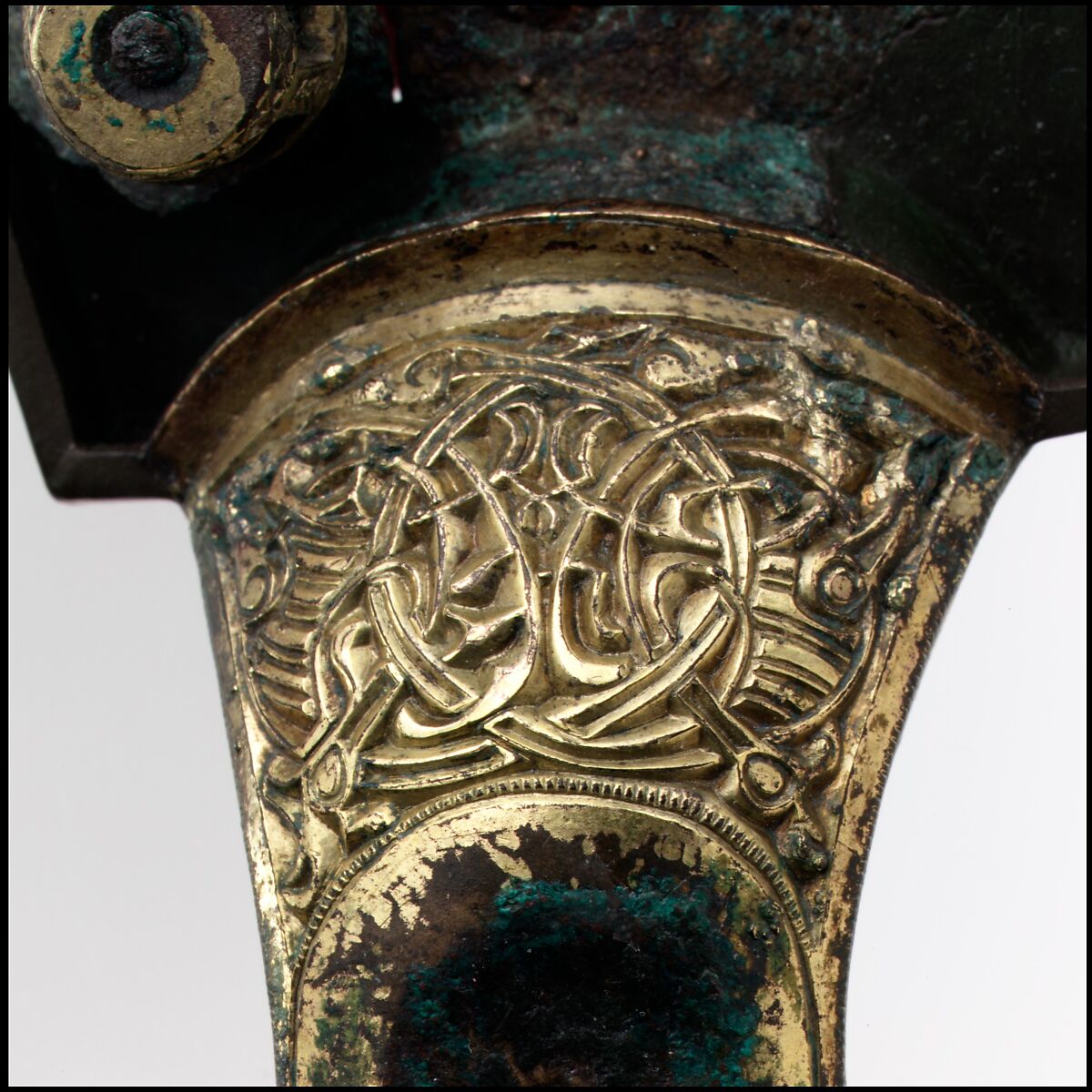 Bow Brooch with Disk, Copper alloy with mercury gilding and garnet, Vendel