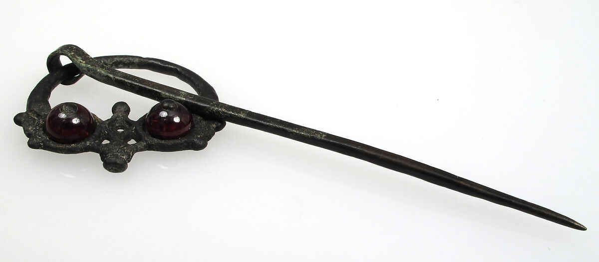 Penannular Brooch, Bronze, garnets, Irish