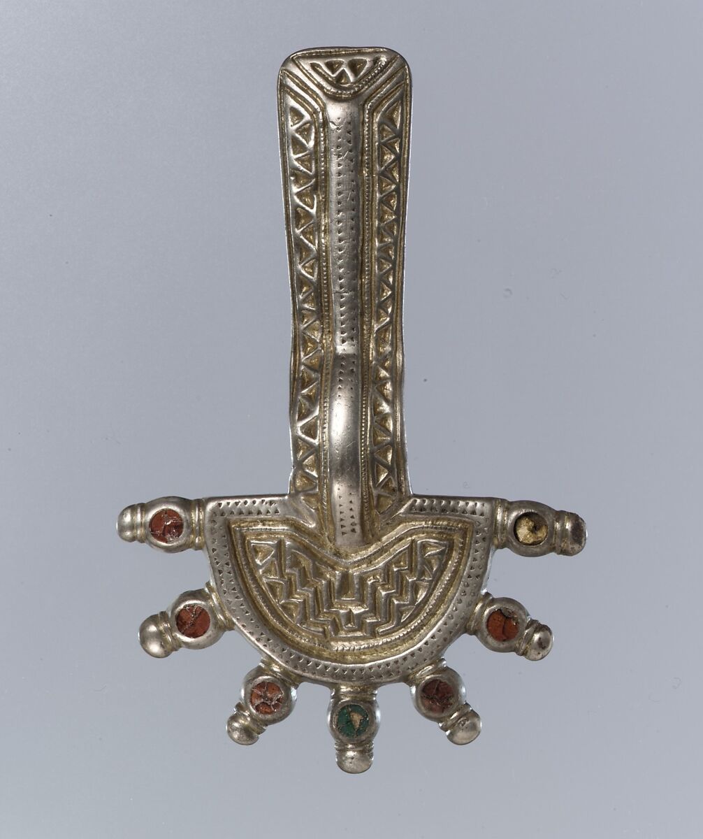 Bow Brooch, Silver-gilt, niello, garnet, glass, Frankish 