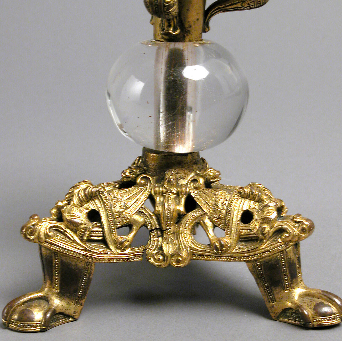 Pricket Candlestick with Fantastic Creatures, Gilt copper alloy, rock crystal, South Netherlandish