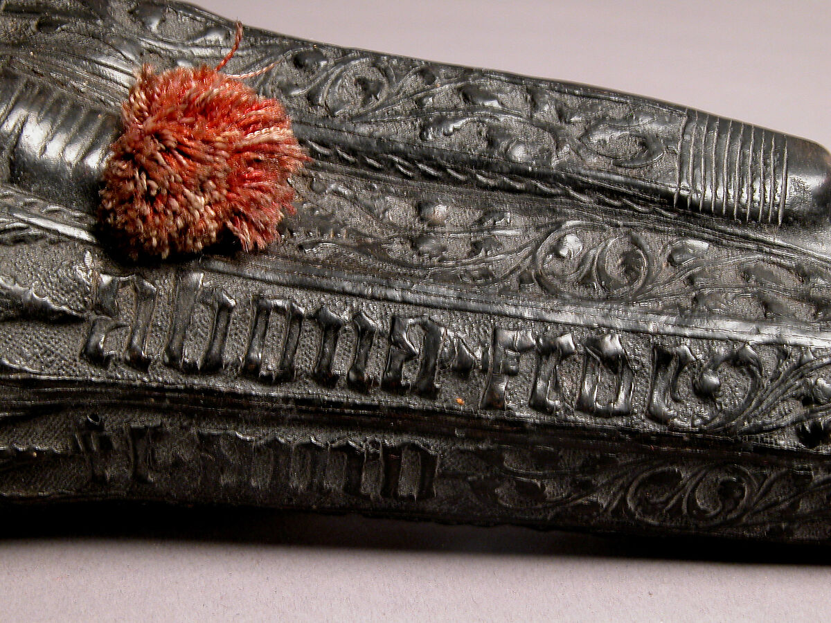 Case (étui) with an amorous inscription, Leather (Cuir bouilli), wood core, red cord, Italian