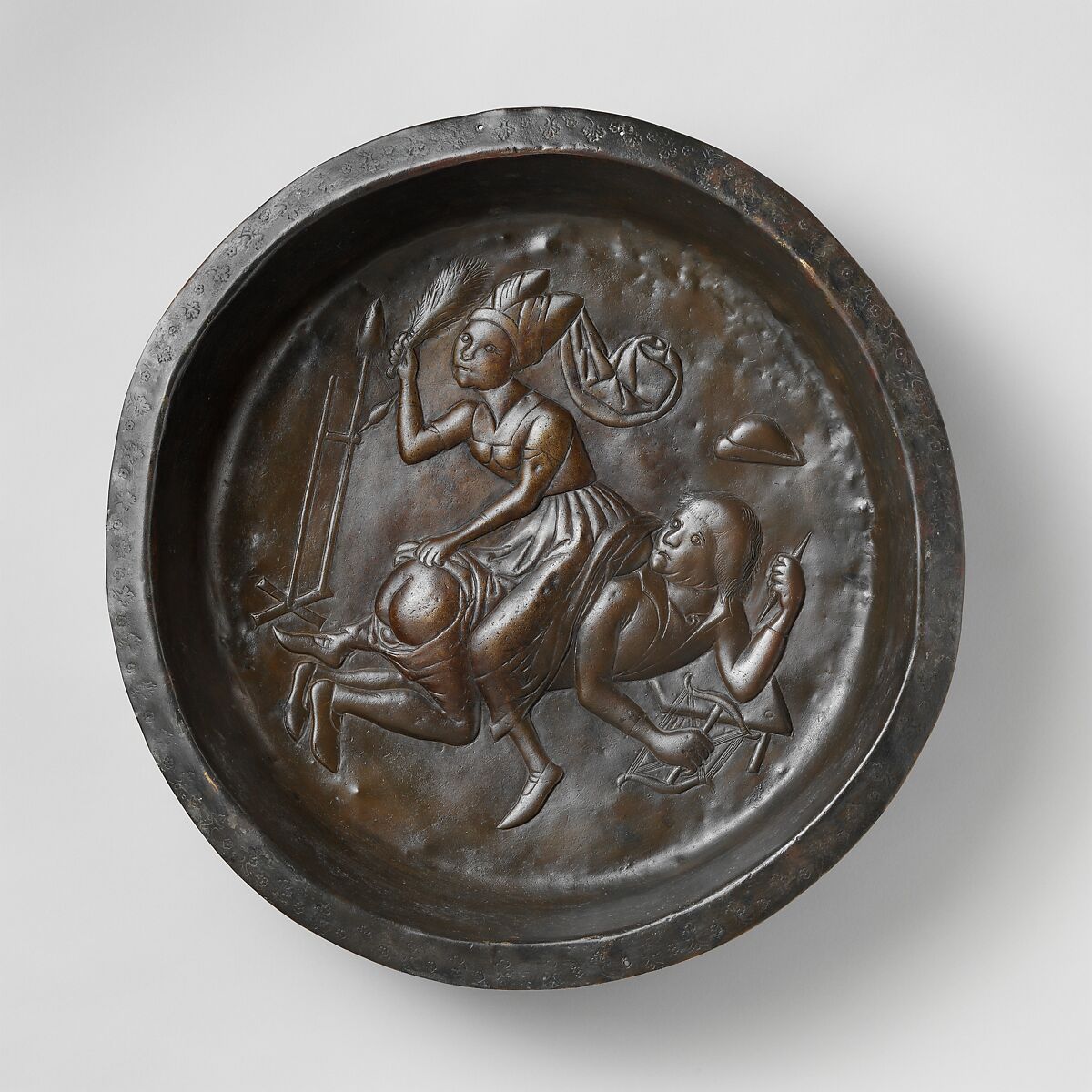 Plate with Wife Beating Husband, Copper alloy, wrought, Netherlandish 