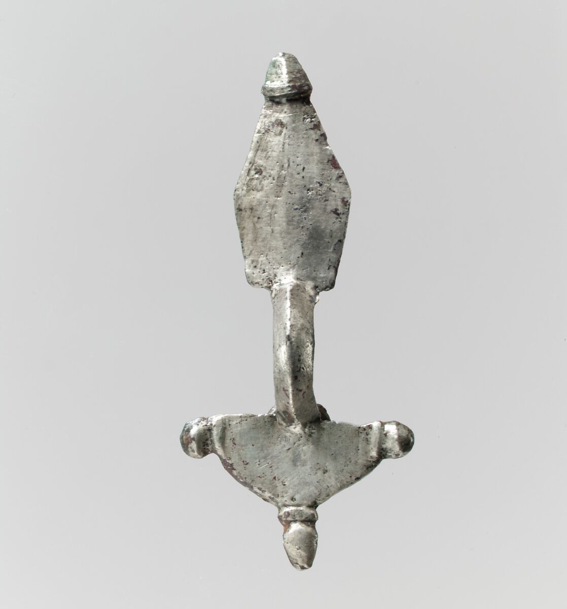 Bow Brooch, Silver - cast.  Pin: copper alloy with silver overlay, Ostrogothic