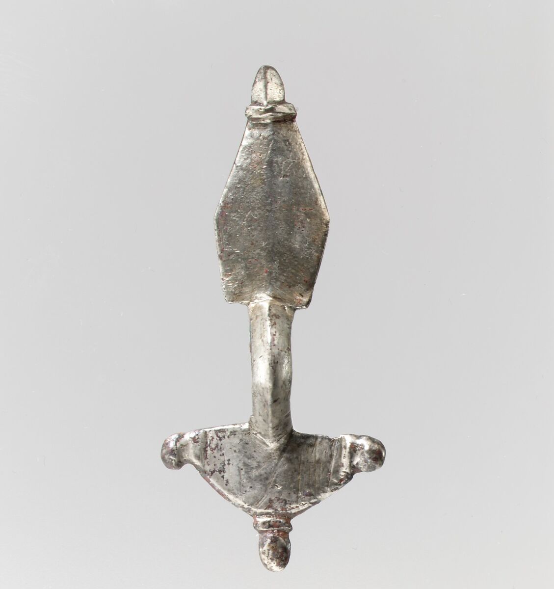 Bow Brooch, Silver - cast.  Pin: copper alloy., Ostrogothic