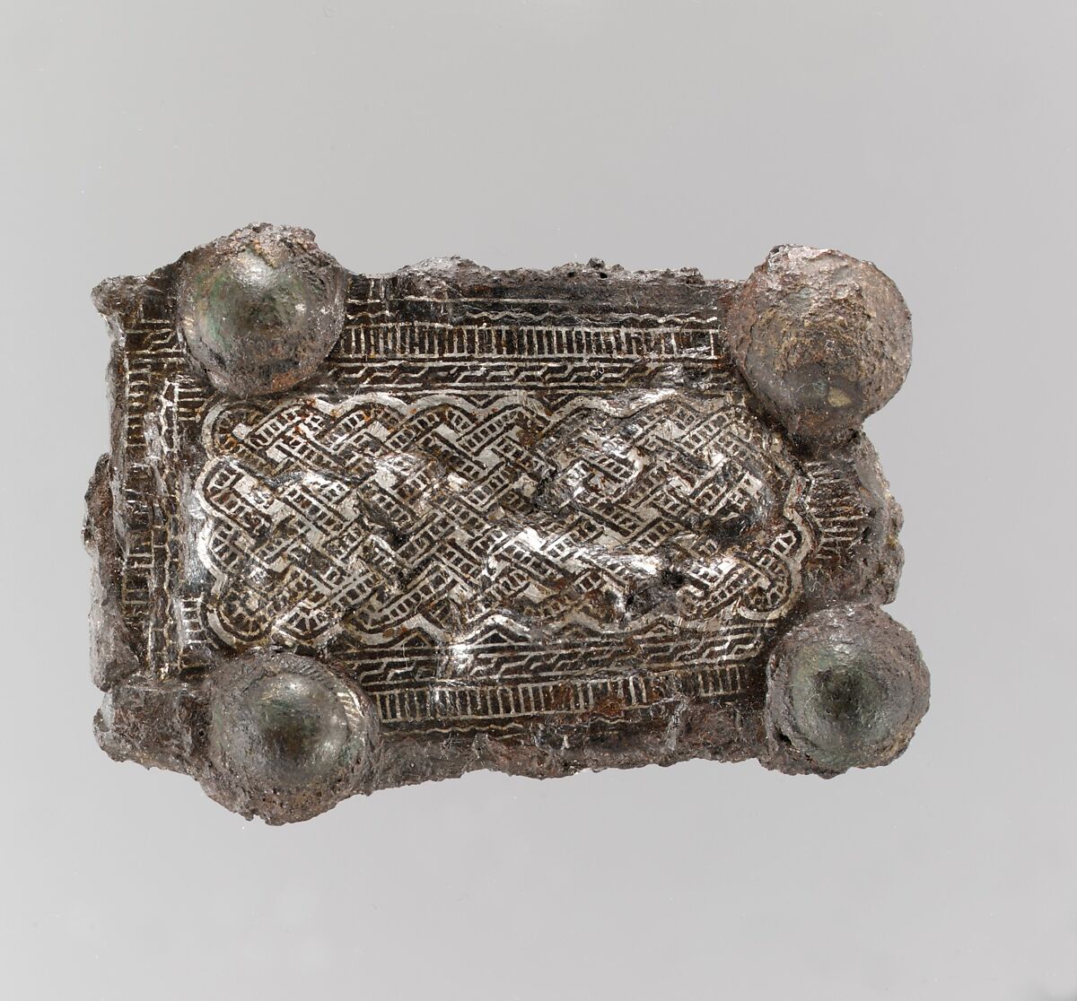 Counter Plate of a Belt Buckle, Iron, silver inlay and copper alloy rivets with incised borders, Frankish or Burgundian 