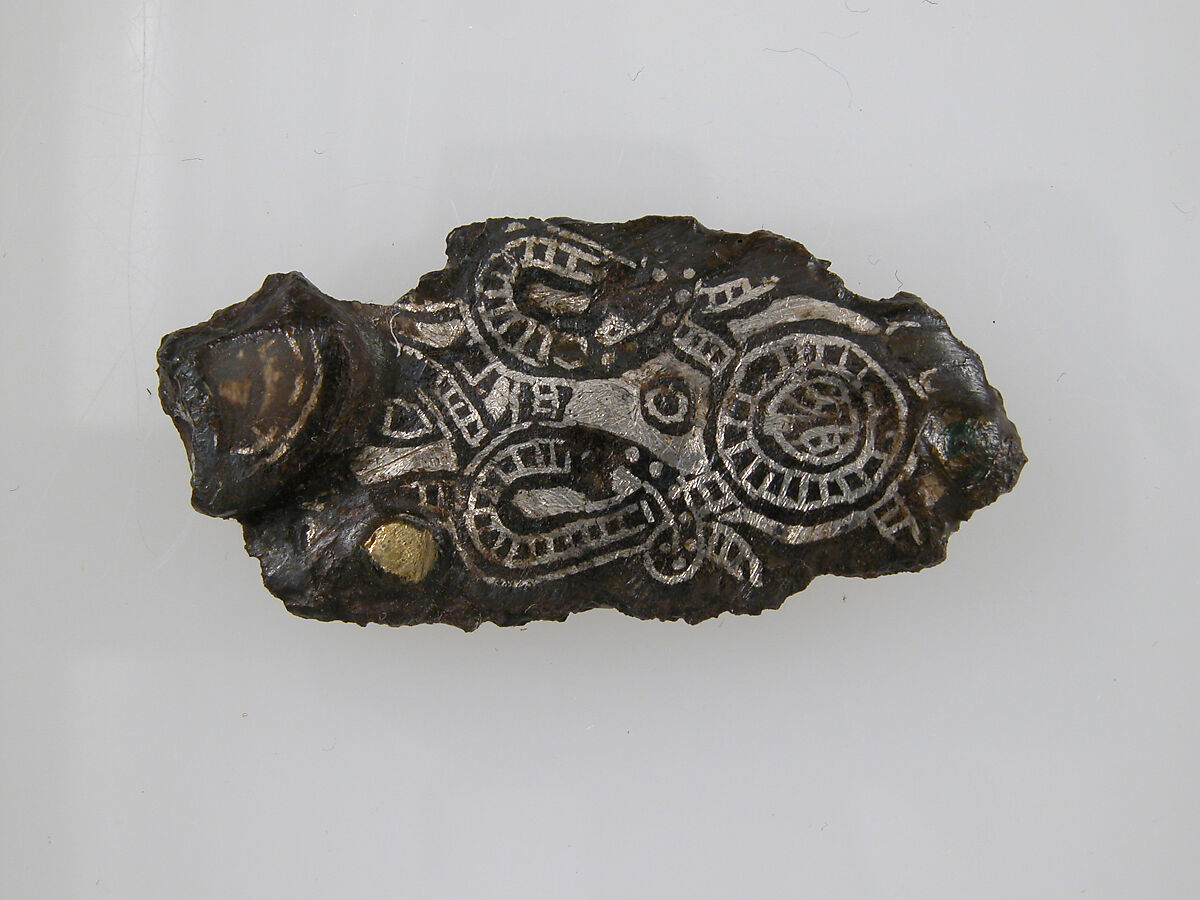 Plate Fragment of a Belt Buckle, Iron, silver and brass inlay, gilt bronze nail, Frankish 