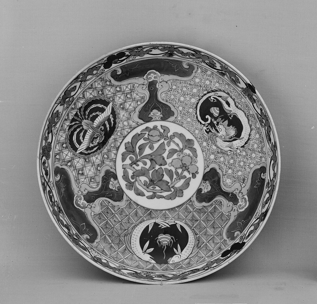 Dish, White porcelain decorated with blue under the glaze, polychrome enamels, Japan 