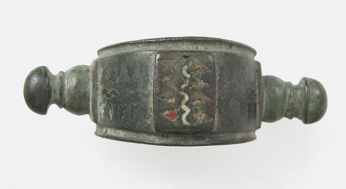 Bow Brooch, Champlevé enamel, bronze, traces of silver, Roman 