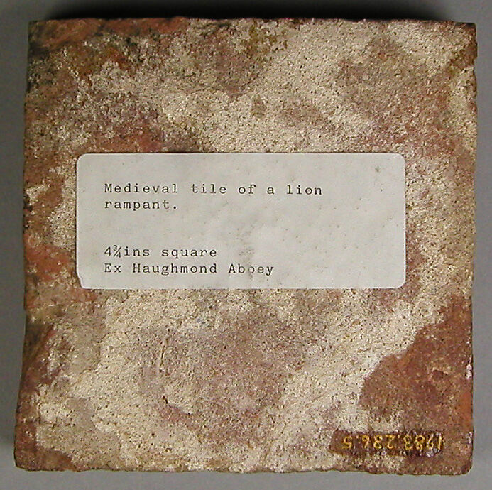 Tile with rampant lion, Fired earthenware, with slip decoration and lead glaze, British