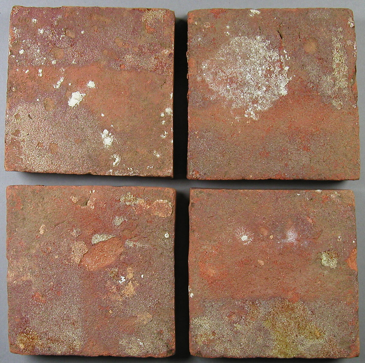 Four Two-Colored Tiles, Fired earthenware with slip decoration and lead glaze, British