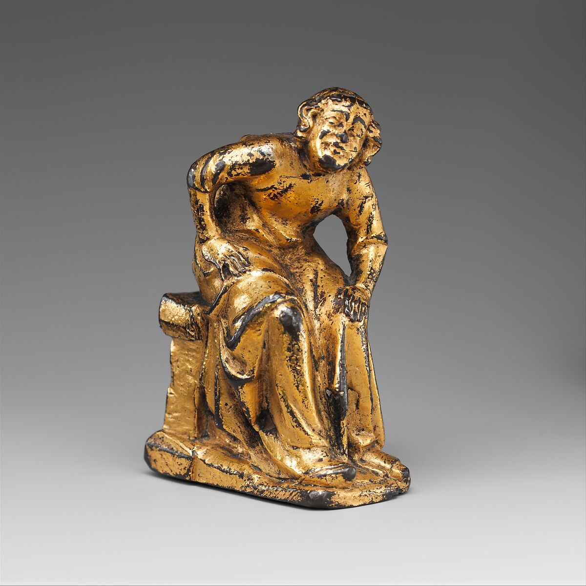 Support Figure of a Seated Cleric or Friar, Copper alloy with mercury gilding, French 