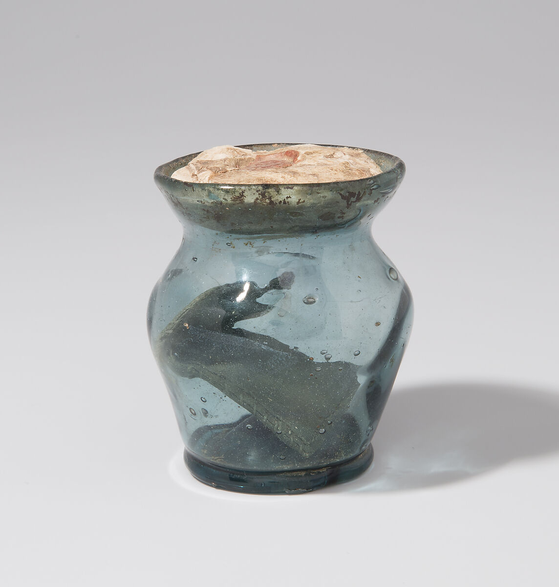 Glass Reliquary, Free-blown glass with applied decoration, boiled leather, silk, wax, and possible human remains, German or Netherlandish