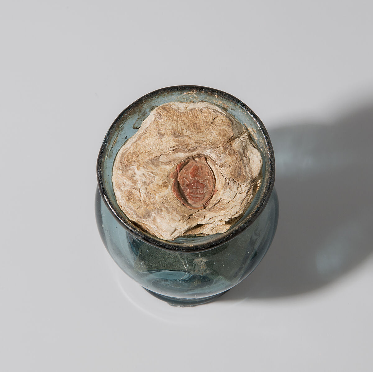 Glass Reliquary, Free-blown glass with applied decoration, boiled leather, silk, wax, and possible human remains, German or Netherlandish