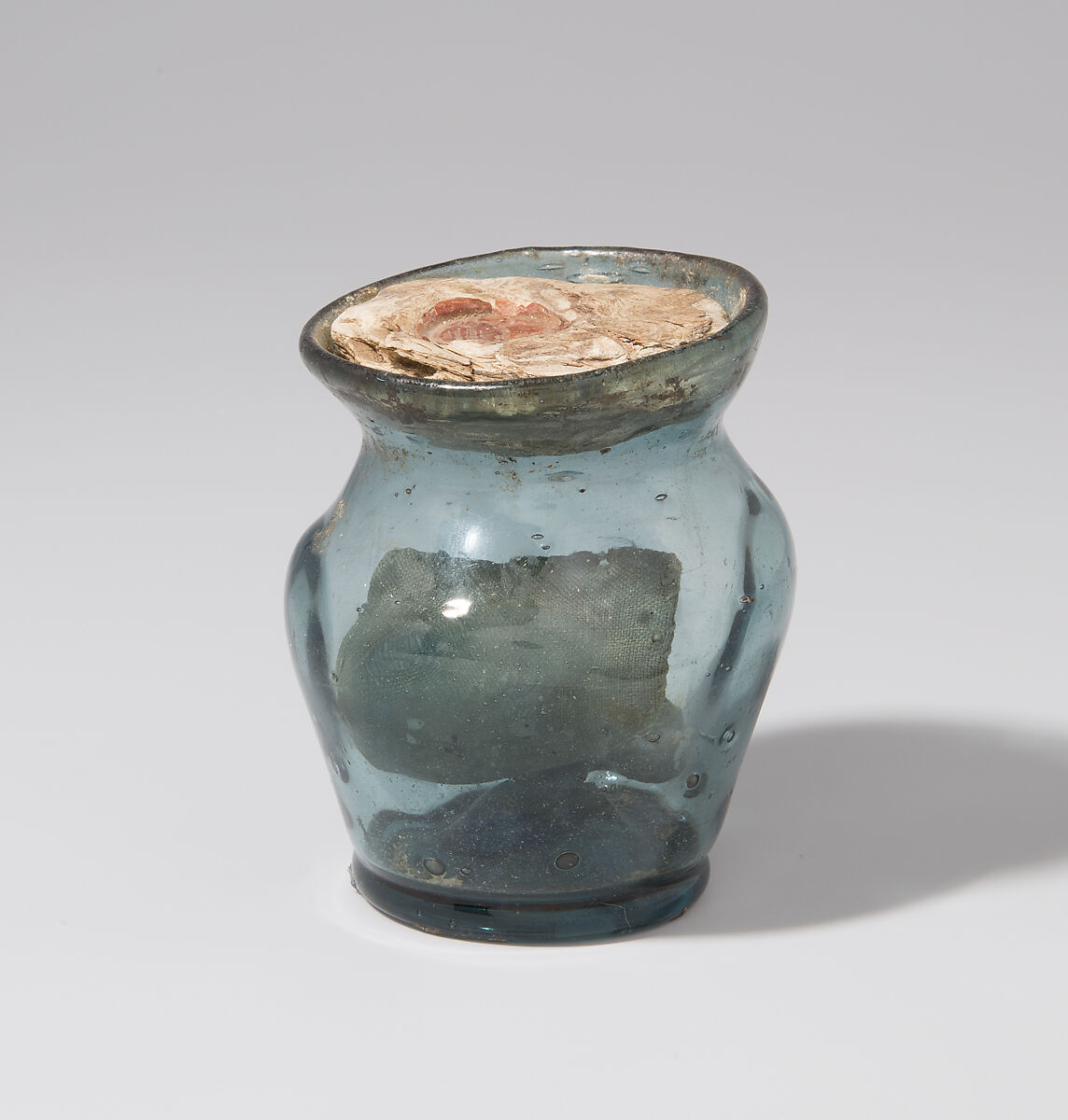 Glass Reliquary, Free-blown glass with applied decoration, boiled leather, silk, wax, and possible human remains, German or Netherlandish