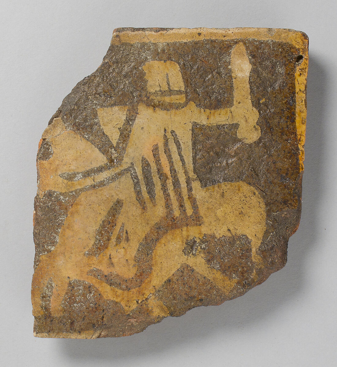 Tile, with helmeted knight on horseback, Fired earthenware, with slip decoration and lead glaze, British 