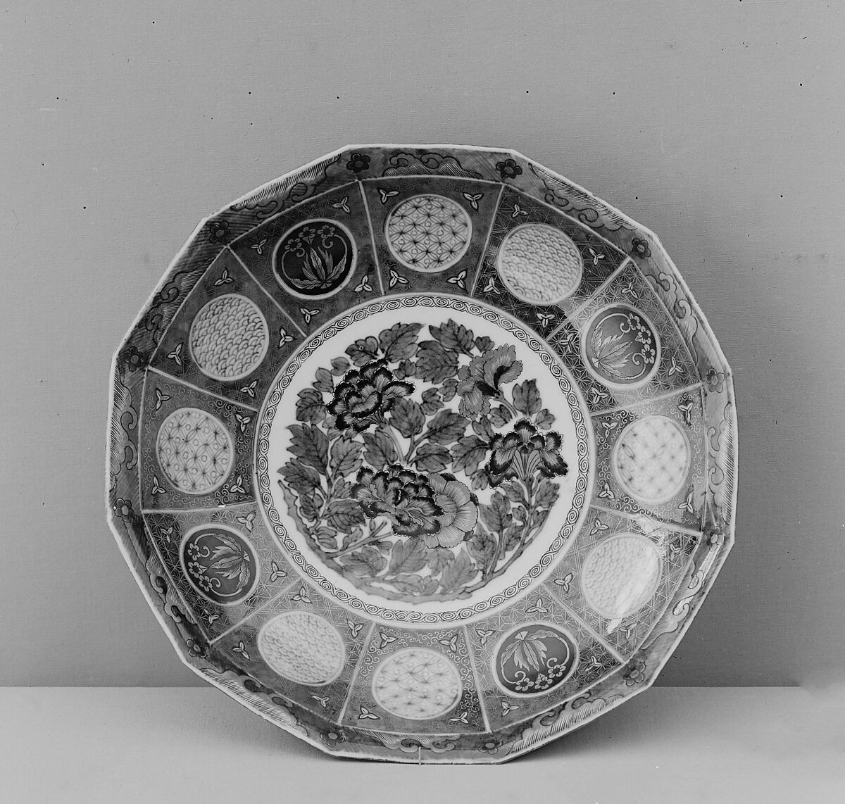 Dish, White porcelain decorated with blue under glaze; iron red and gold (Arita ware), Japan 