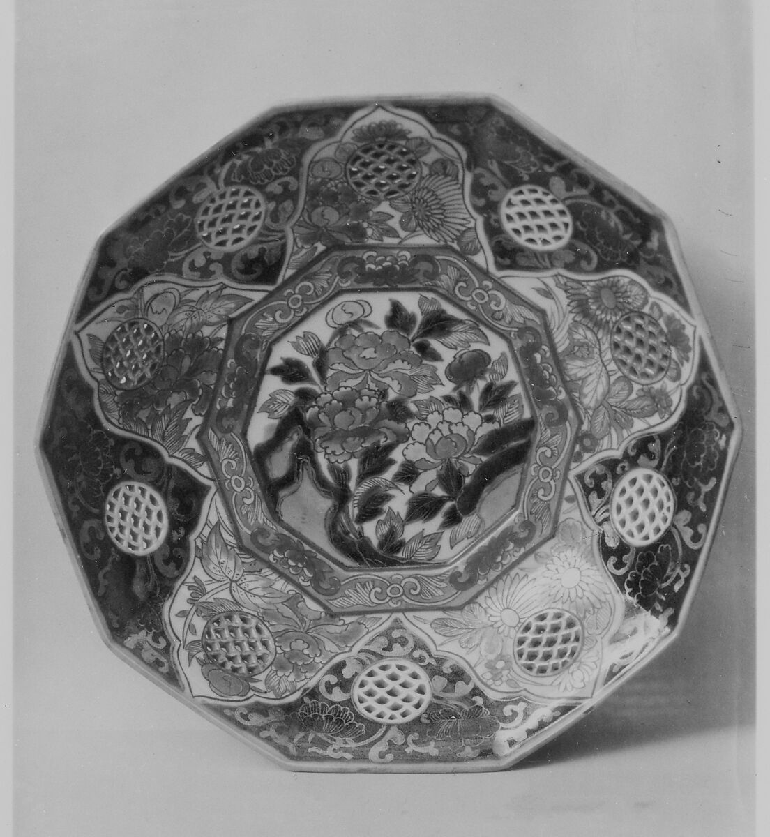 Plate, Porcelain decorated in enamels and pierced medallions (Arita ware, Imari type), Japan 