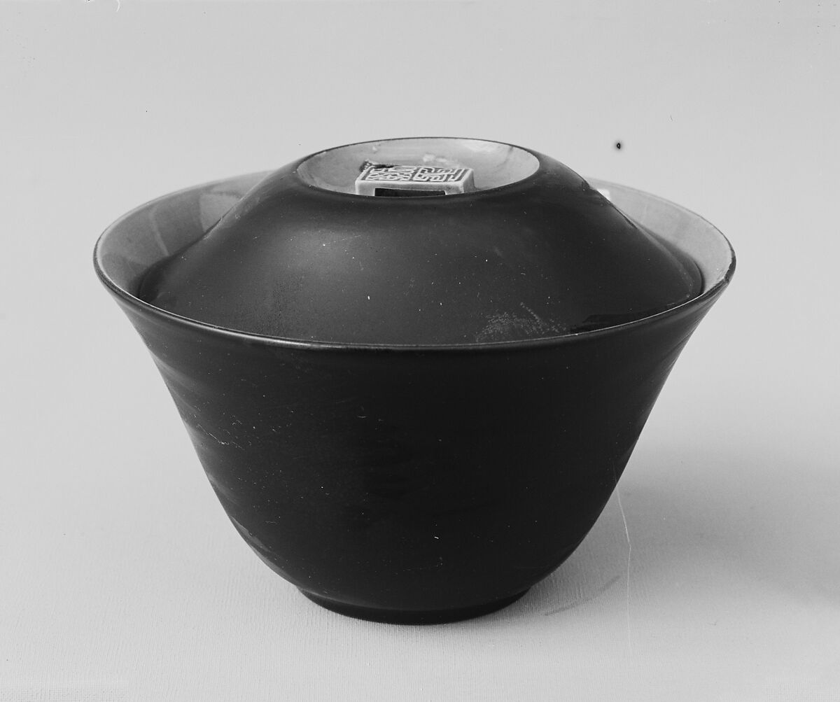 Bowl and Cover, Minpei (active 19th century), Porcelaneous ware covered with a finely crackled glaze over which is a black enameled glaze (Awaji ware), Japan 