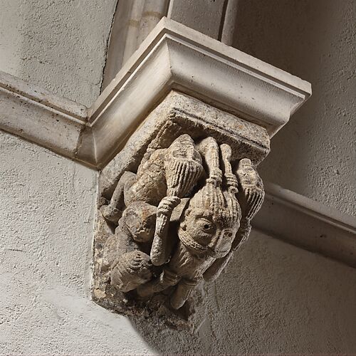 Corbel with Five Interlaced Hair-Pulling Acrobats