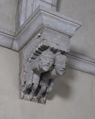 Corbel with Two Men with Fingers in Mouths
