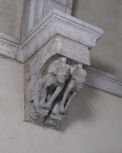 Corbel with Two Men with Legs in the Mouth of Two Beasts