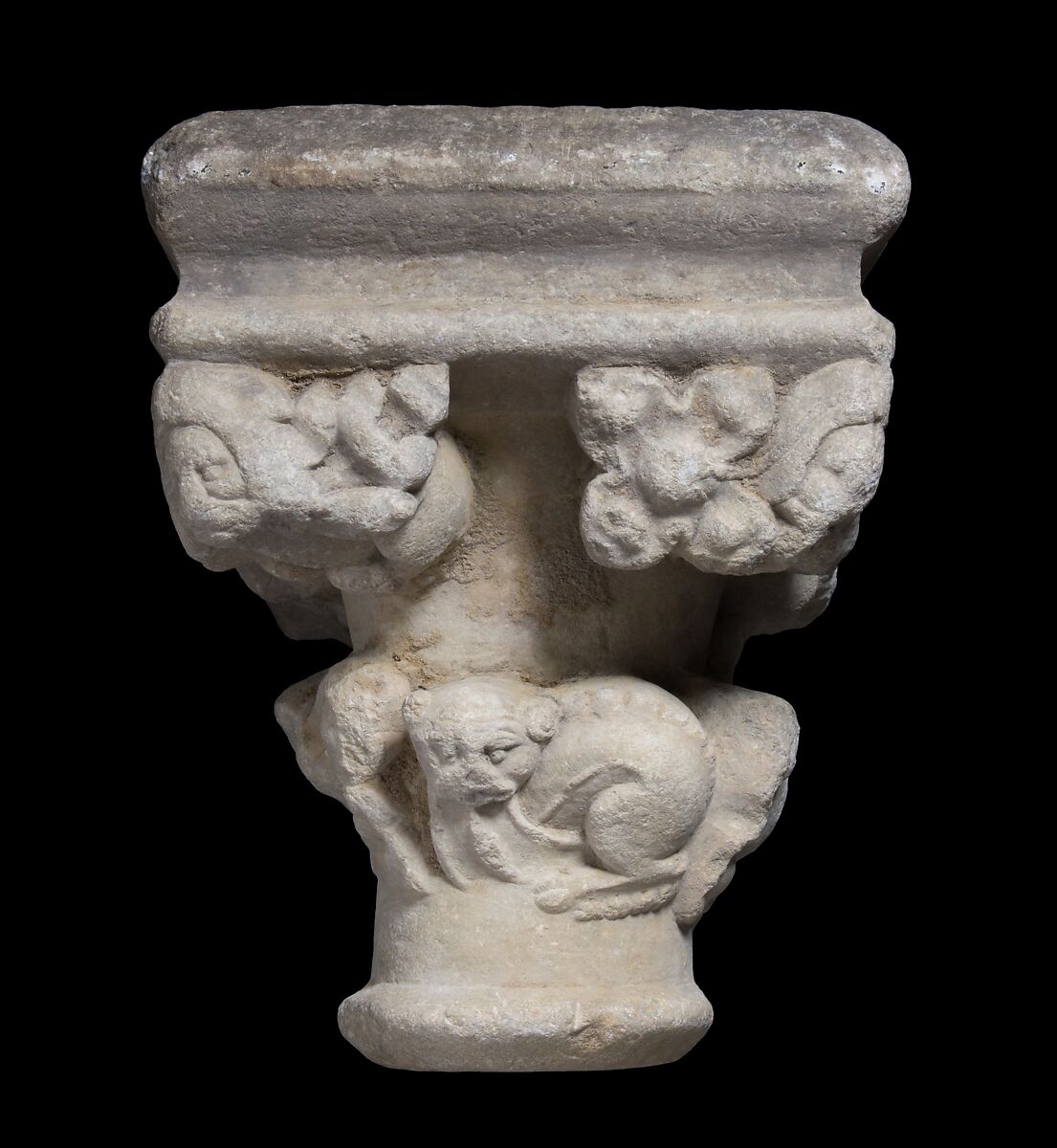 Double Capital, Limestone or sandstone, French