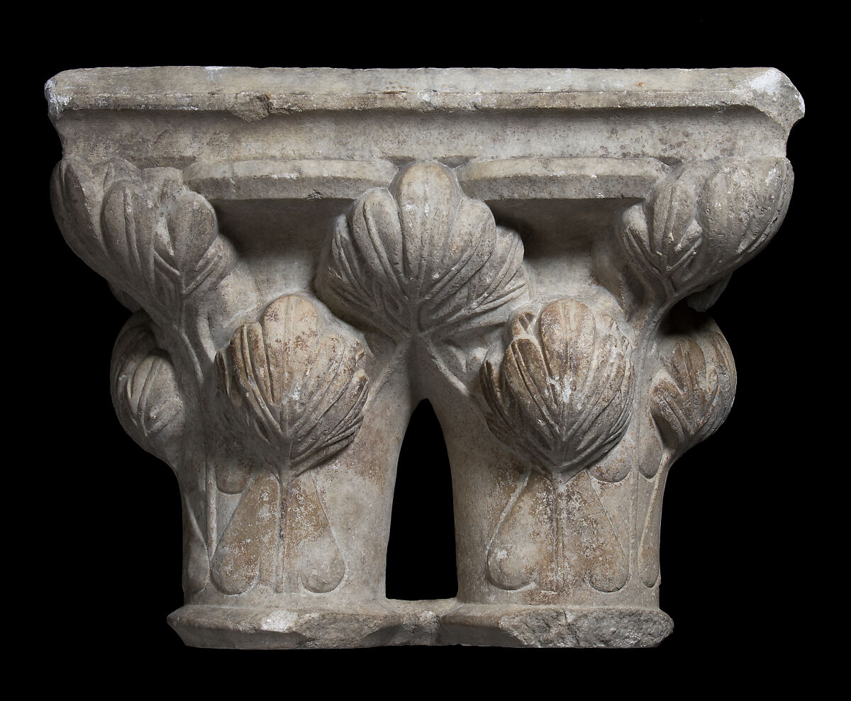 Double Capital, Limestone or sandstone, French