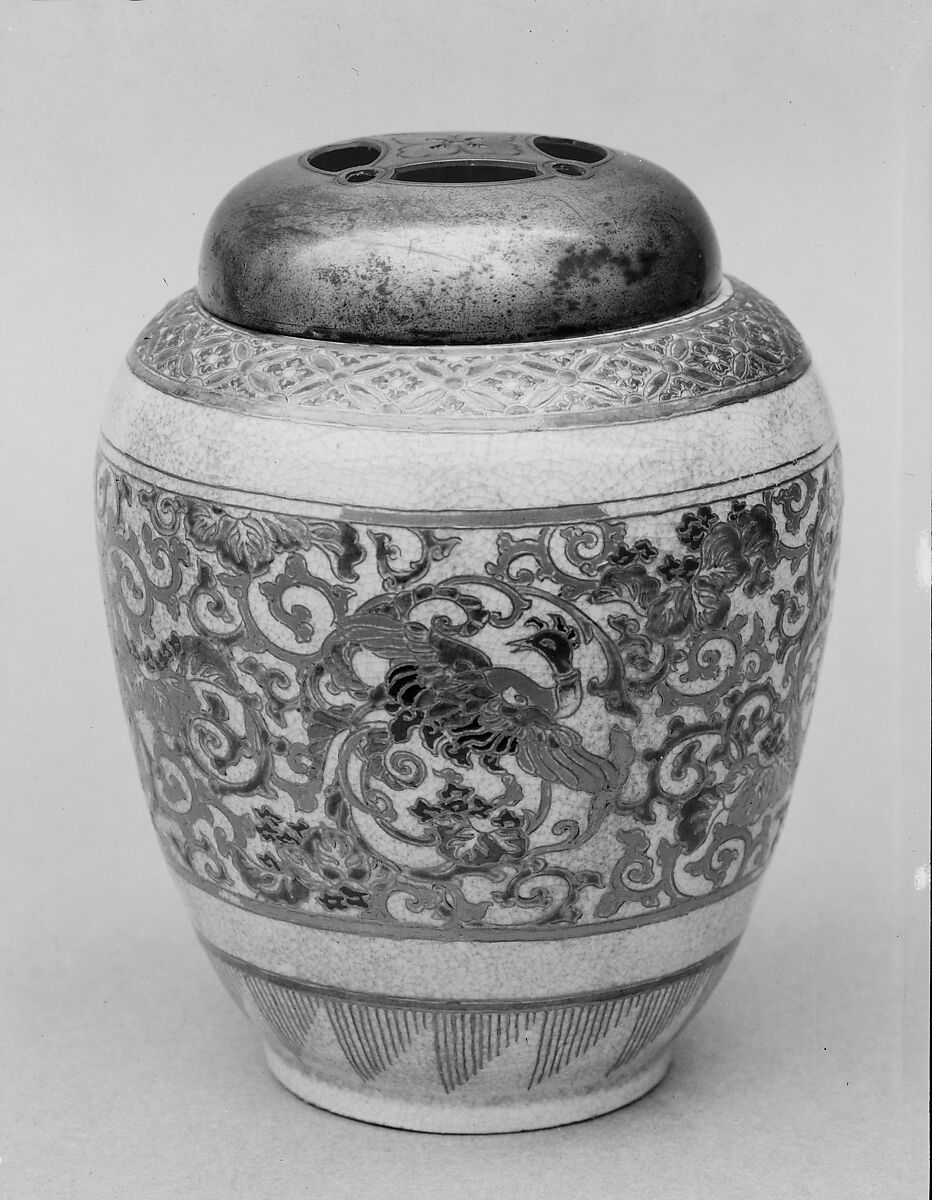 Miniature Jar with Cover, Porcelain, with four pheasant medallions in scroll setting, enameled in blue, green, red and black with gold, on creamy white crackled glaze; diaper design in red and green enamels at neck; lowest register decorated with triangle pattern of gold striations; cover of silver alloy with floral design cut out and incised (Satsuma ware), Japan 