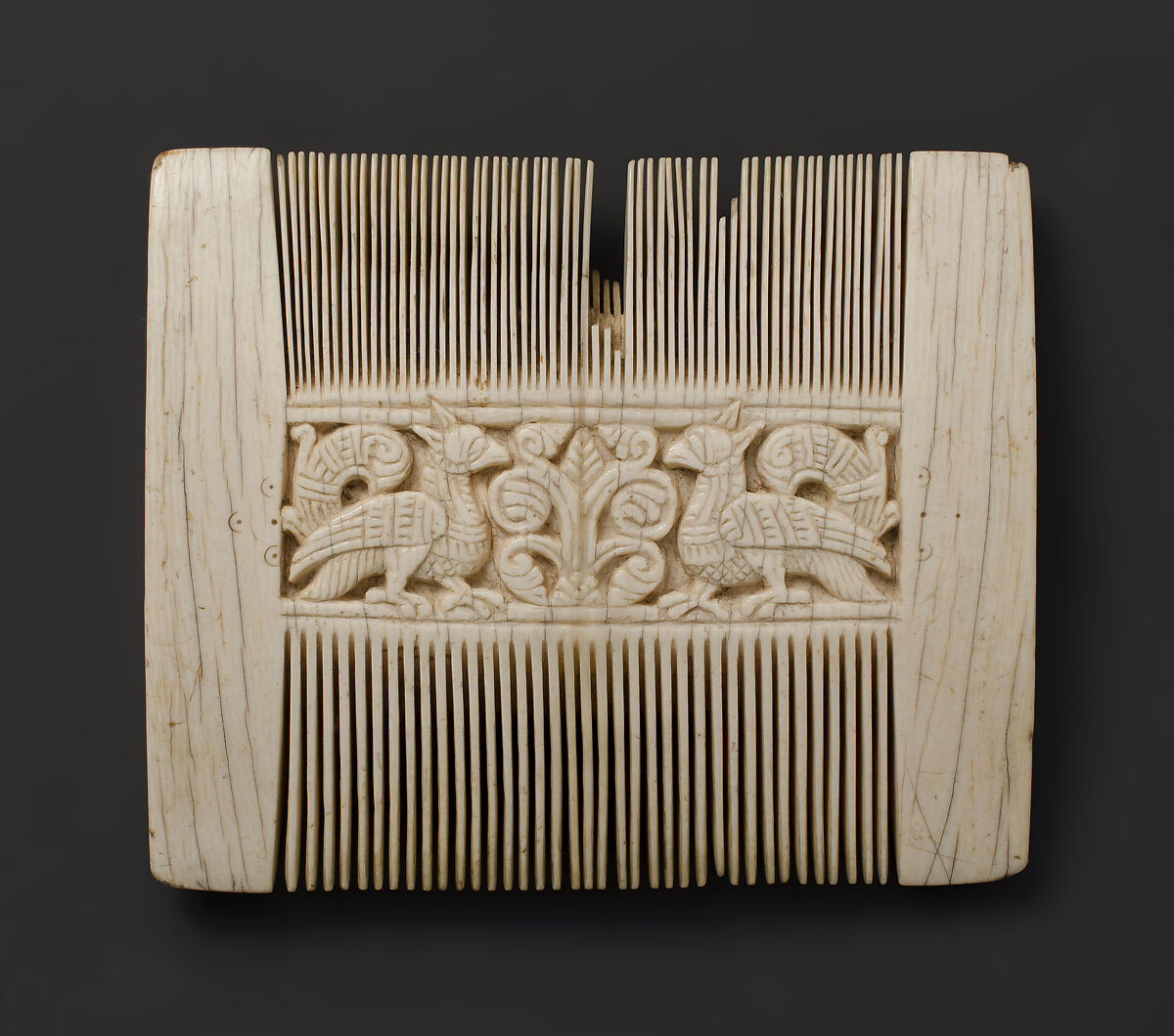 Comb with Putti and Sea Creatures, Elephant ivory, Italian