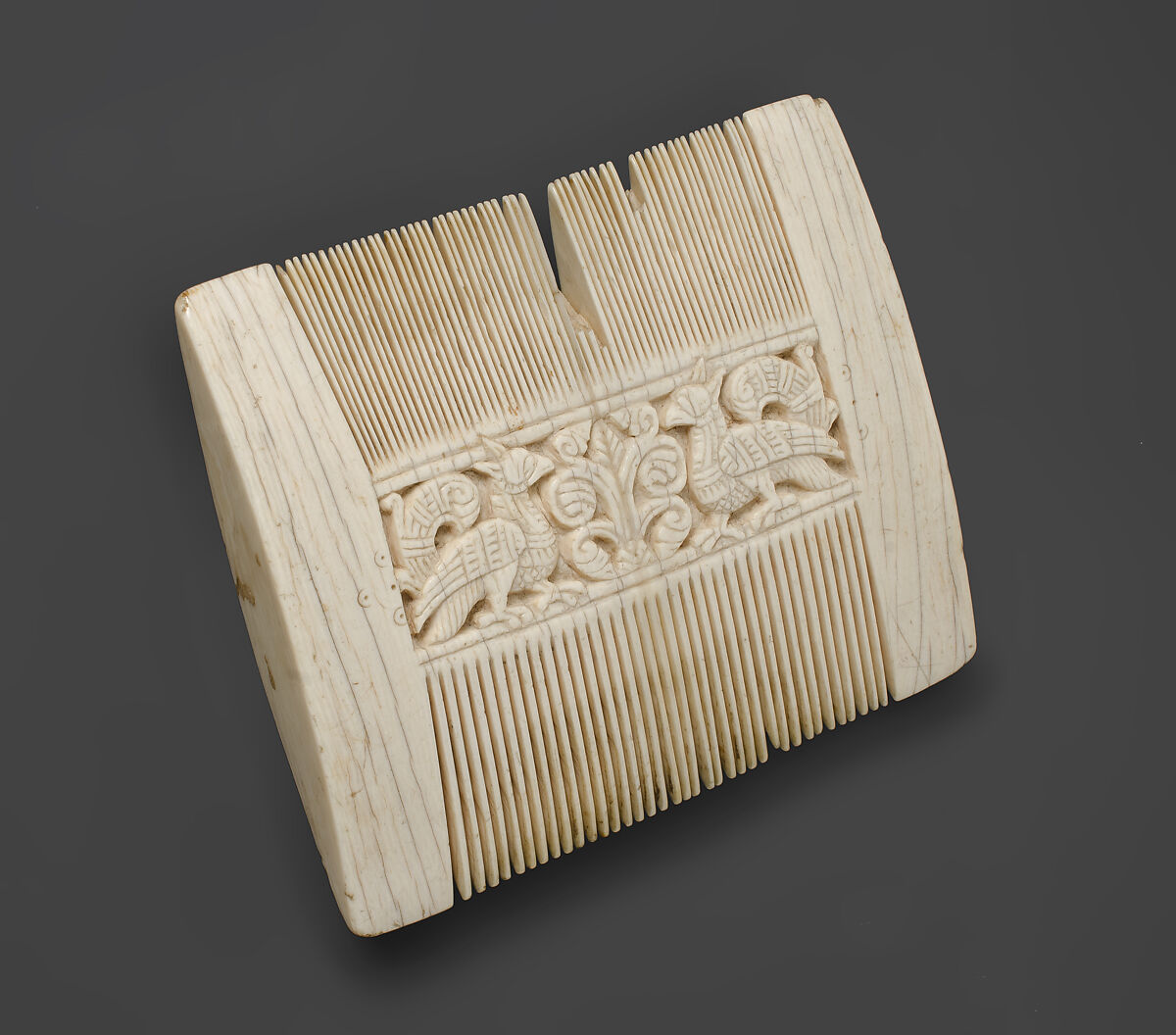 Comb with Putti and Sea Creatures, Elephant ivory, Italian