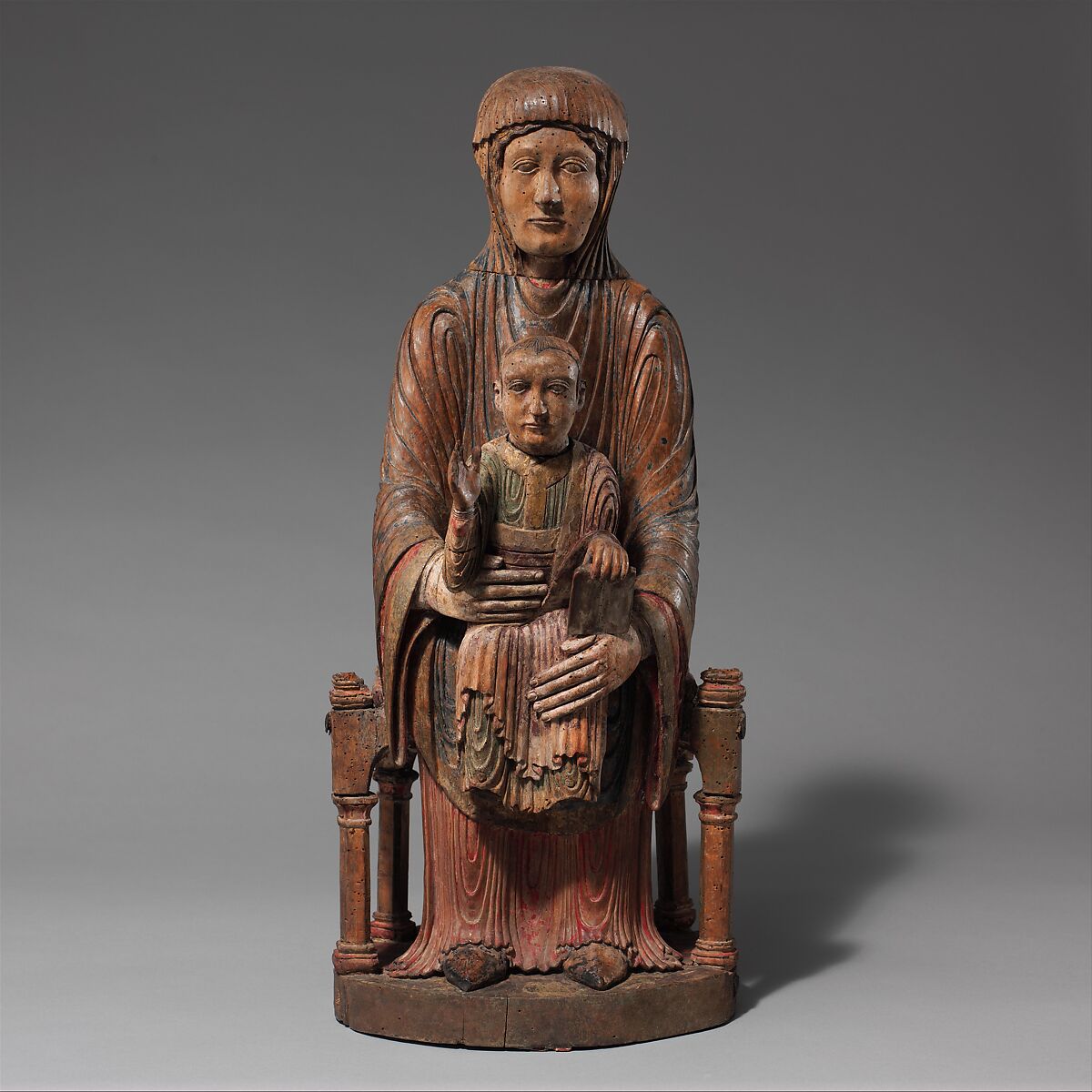 Enthroned Virgin and Child, Walnut with gesso, paint, tin leaf, traces of linen, and possible human remains, French