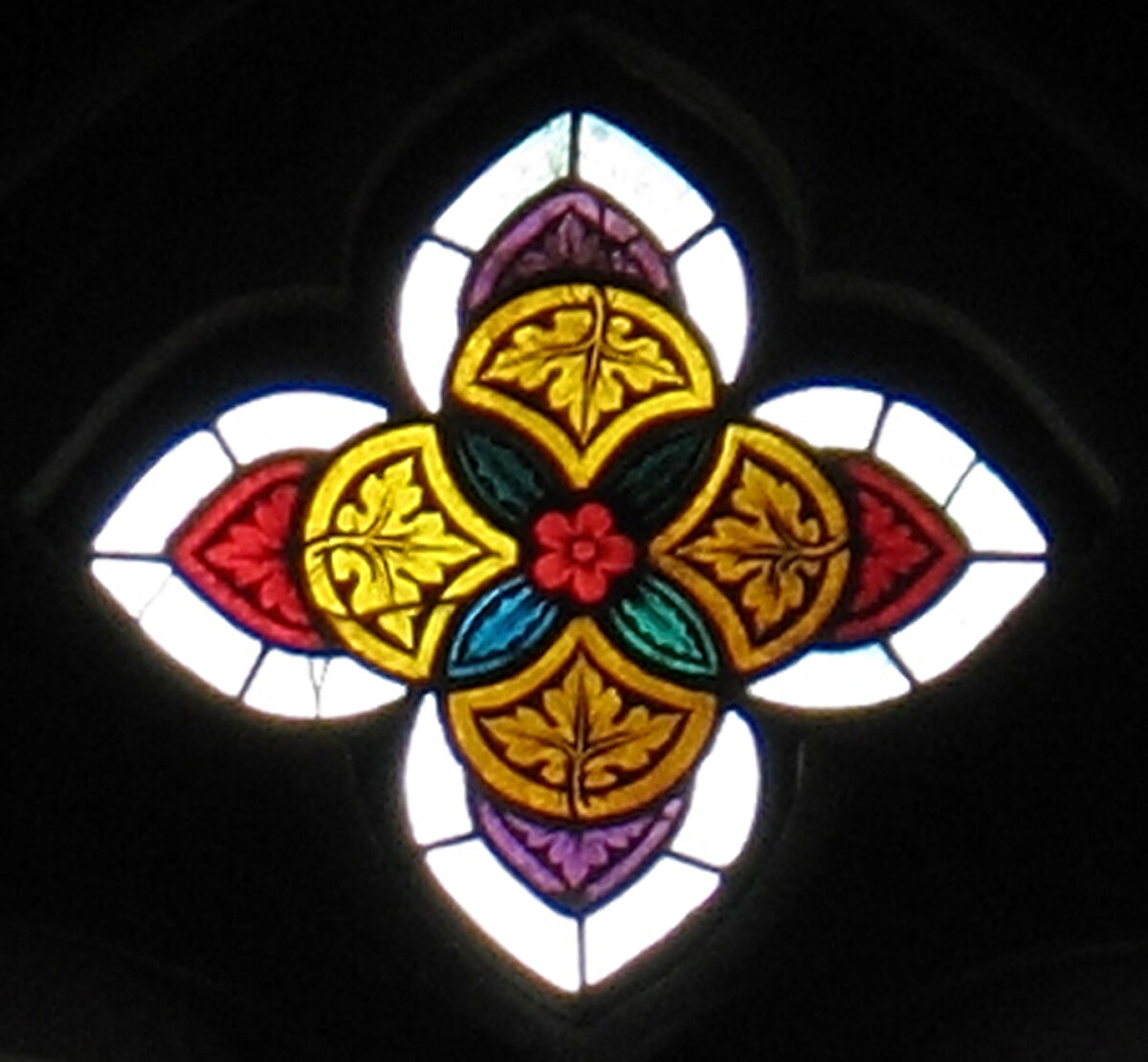 Quatrefoil-shaped Tracery Light, Pot-metal and colorless glass with vitreous paint, Austrian 