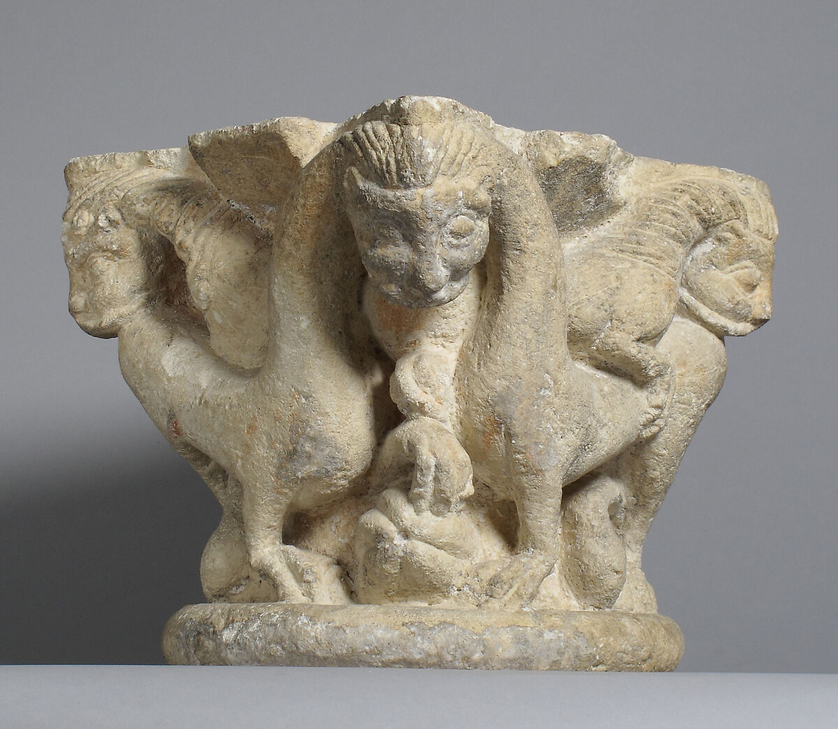 Capital with intertwining animals, Yellow limestone, with traces of red paint, French