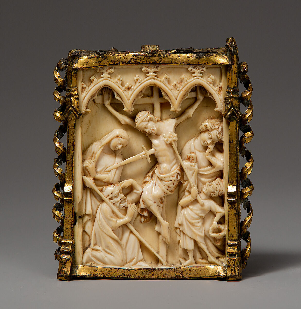 Pax with the Crucifixion, Ivory and copper gilt, South German 