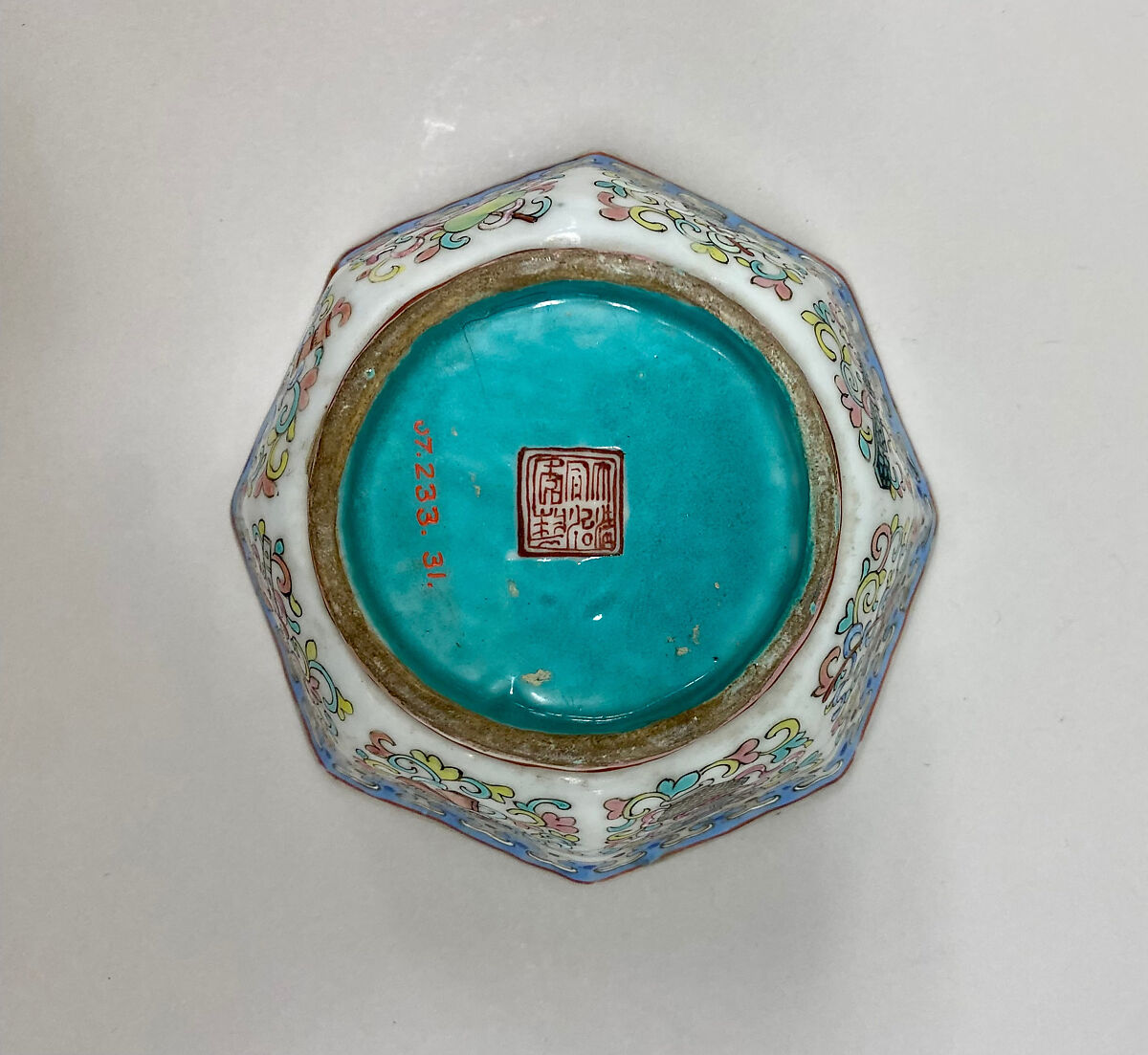 Octagonal bowl with symbols of the Eight Immortals, Porcelain painted in overglaze polychrome enamels, turqoise green glaze inside (Jingdezhen ware), China