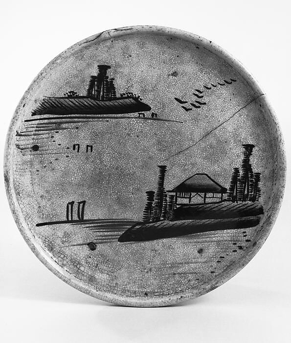 Plate, Pottery; flat with raised rim; design of landscape with flying geese, sailboats and thatched cottage in pine grove, painted in iron pigment on surface of plate (Seto ware), Japan 