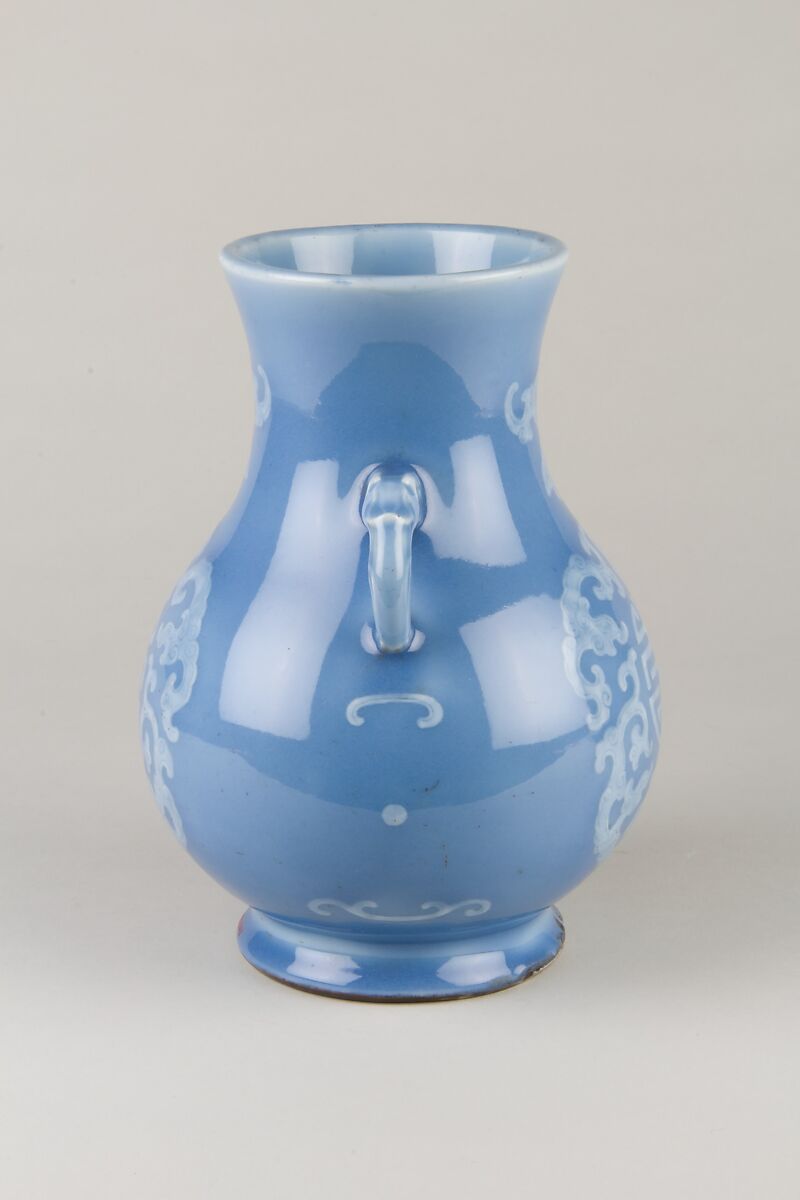 Vase, Porcelain with reserve decoration and slight relief on a light blue ground, China