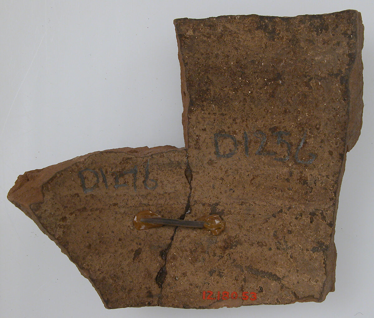 Ostrakon, Pottery fragment with ink inscription, Coptic