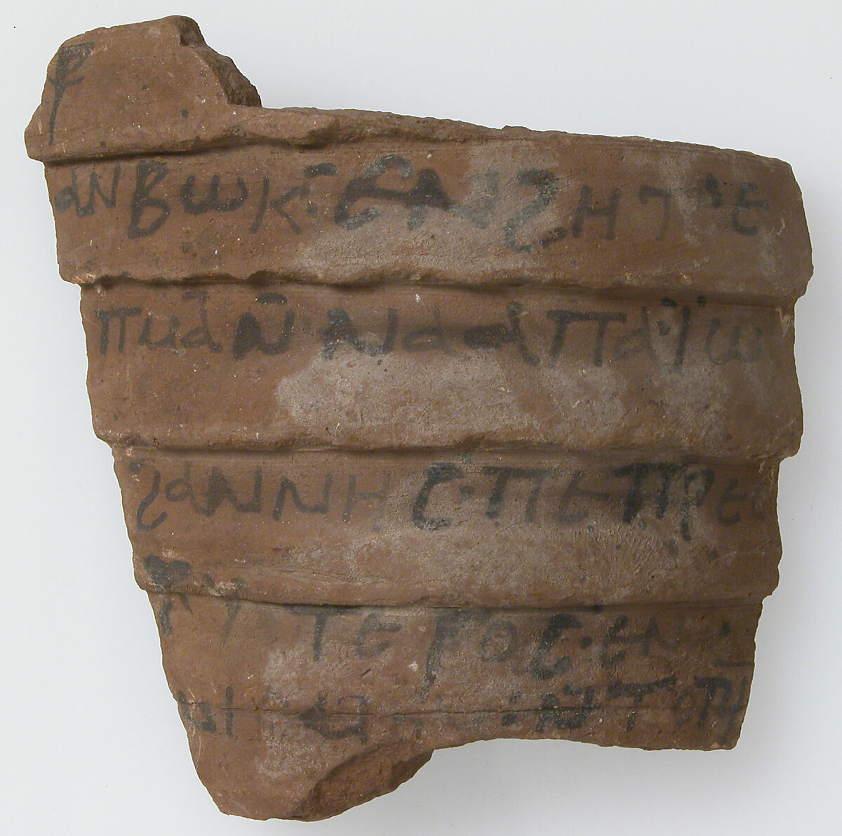 Ostrakon, Pottery fragment with ink inscription, Coptic 