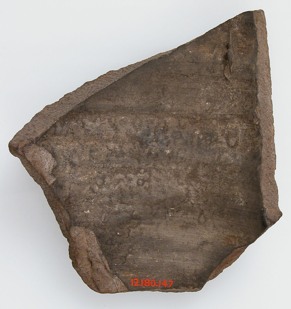 Ostrakon, Pottery fragment with ink inscription, Coptic