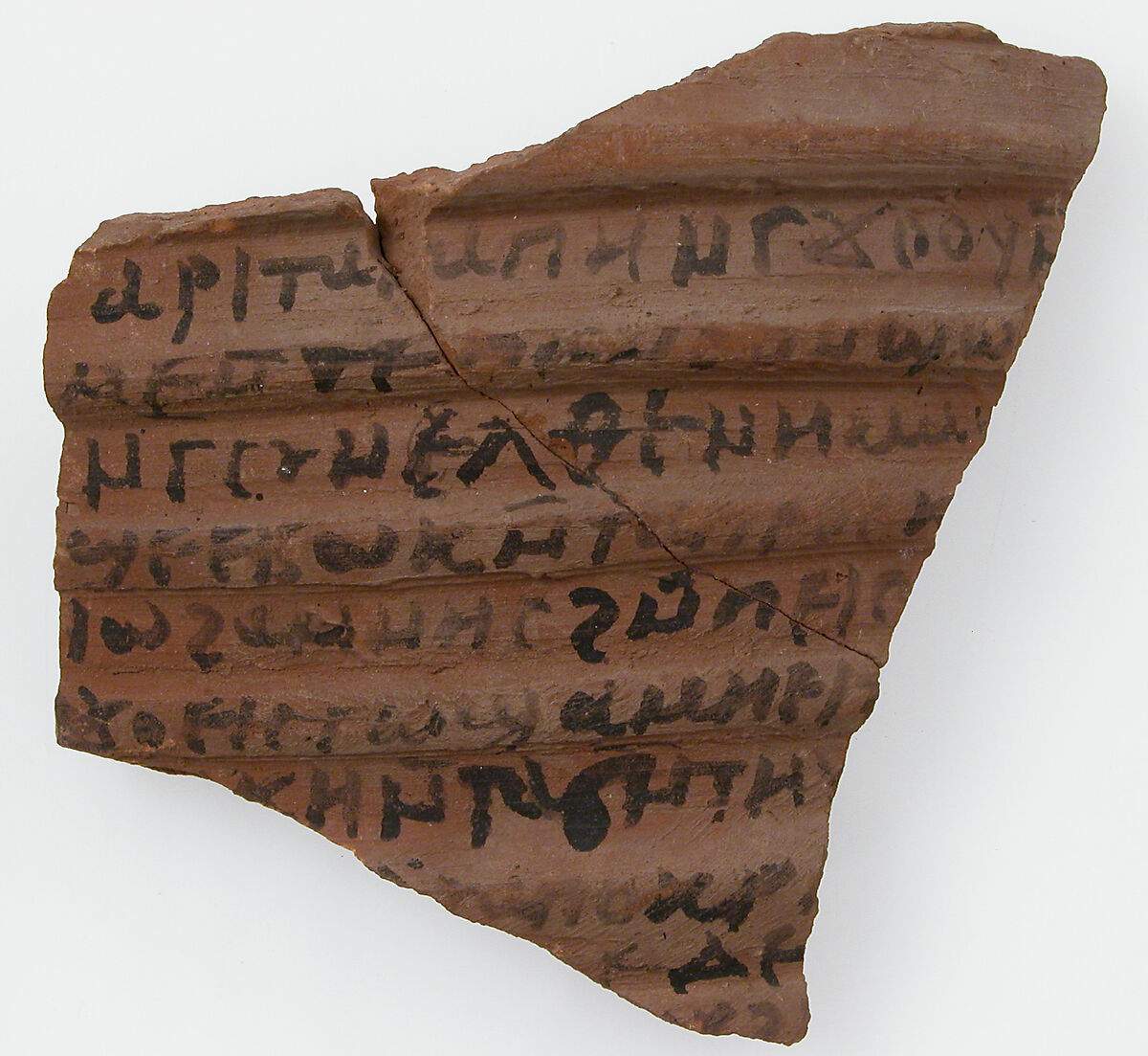 Ostrakon, Pottery fragment with ink inscription, Coptic 