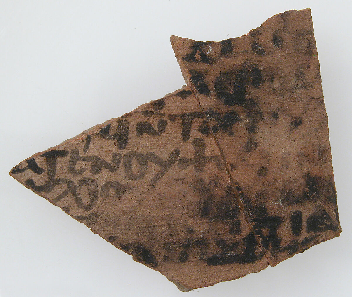 Ostrakon, Pottery fragment with ink inscription, Coptic