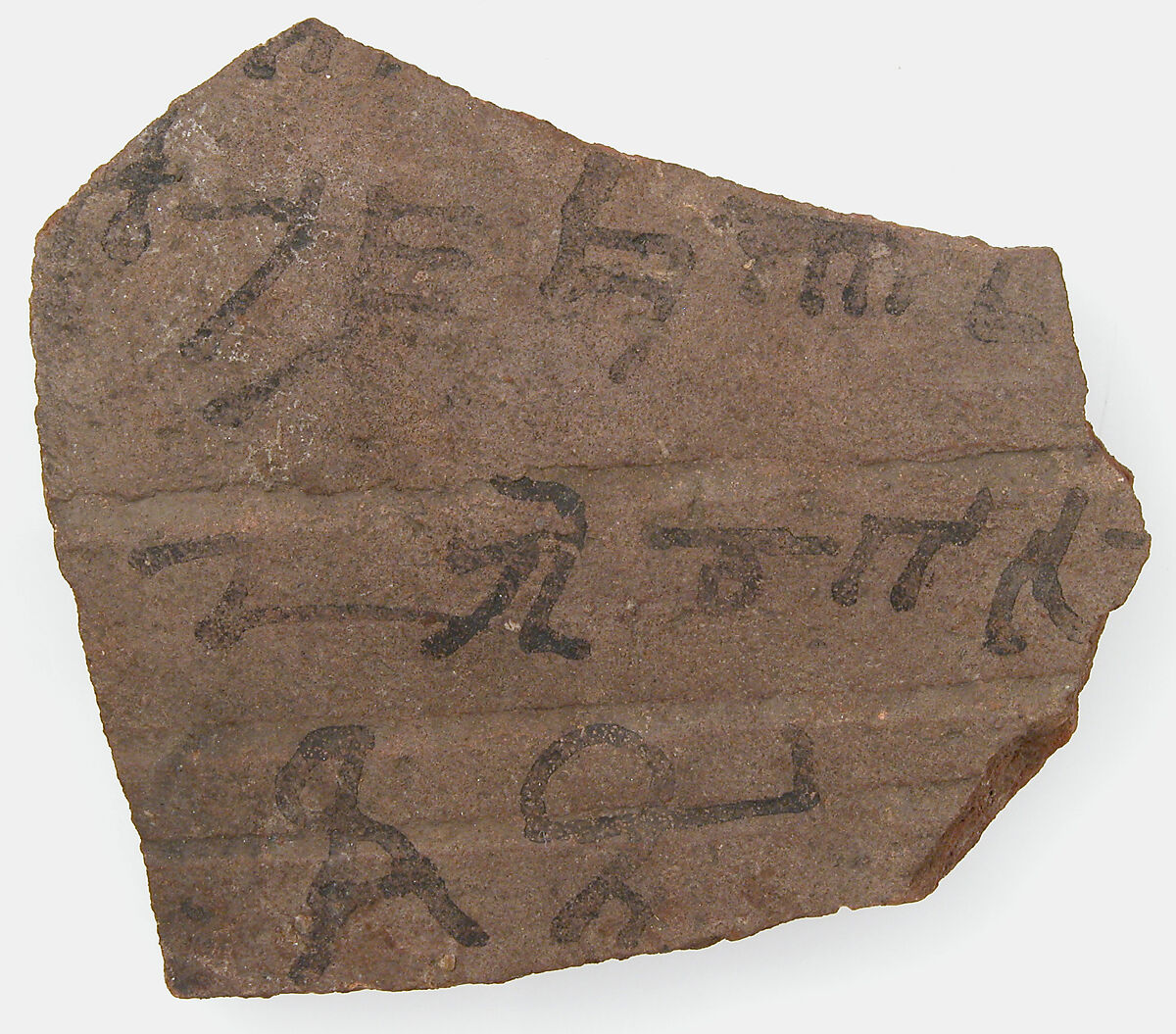 Ostrakon, Pottery fragment with ink inscription, Coptic 