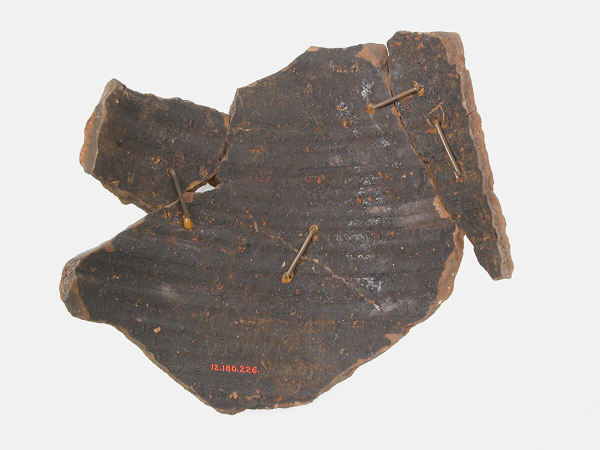 Ostrakon, Pottery fragment with ink inscription, Coptic