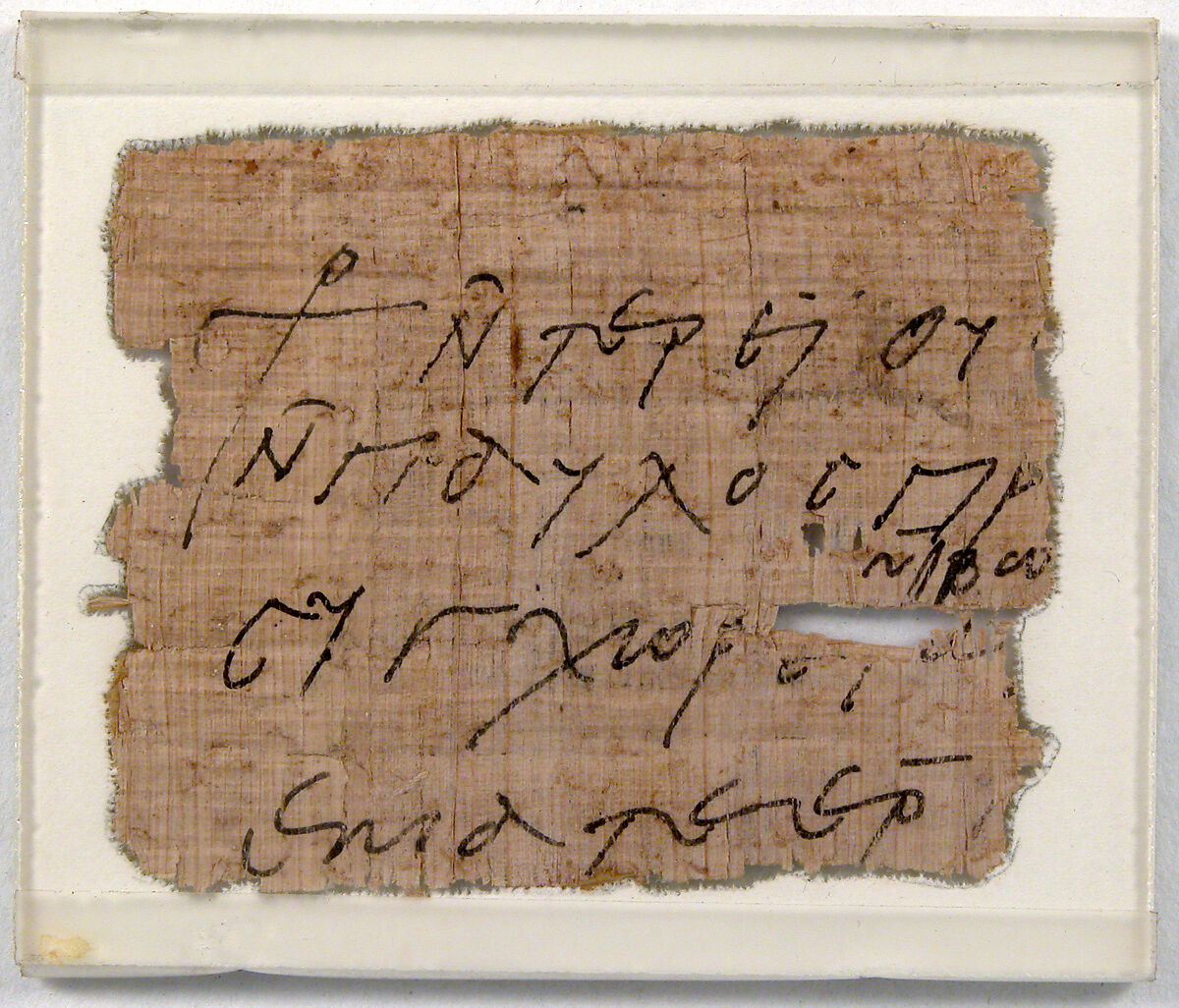 Papyrus Fragment of a Letter from Joinistus to Epiphanius, Papyrus and ink, Coptic
