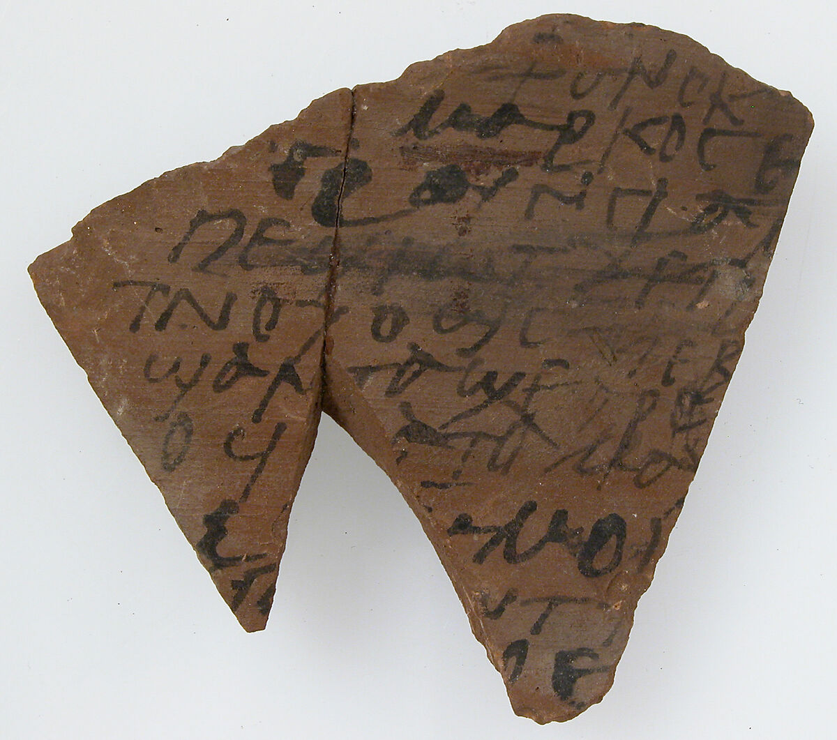 Ostrakon, Pottery fragment with ink inscription, Coptic 