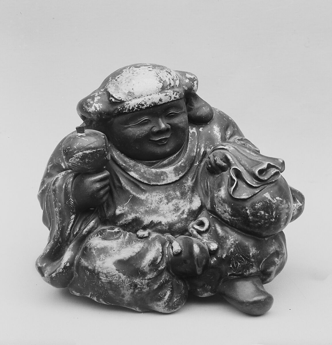 Ornament in the shape of Daikoku, God of Luck, Clay glazed and gilt (Kiyomizu ware), Japan 